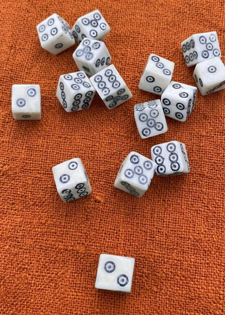 Bone cube based on numerous finds from Roman times and the Middle Ages, polished bone with ebony dust inlay, approx. 1x1cm