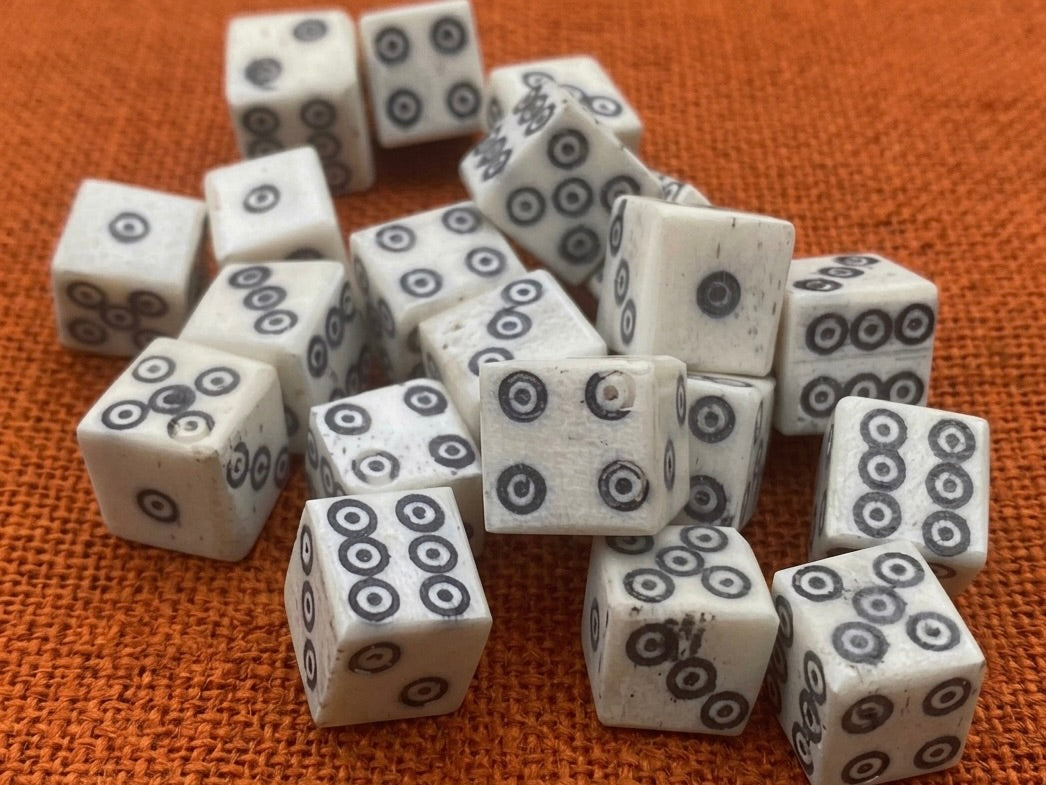 Bone cube based on numerous finds from Roman times and the Middle Ages, polished bone with ebony dust inlay, approx. 1x1cm