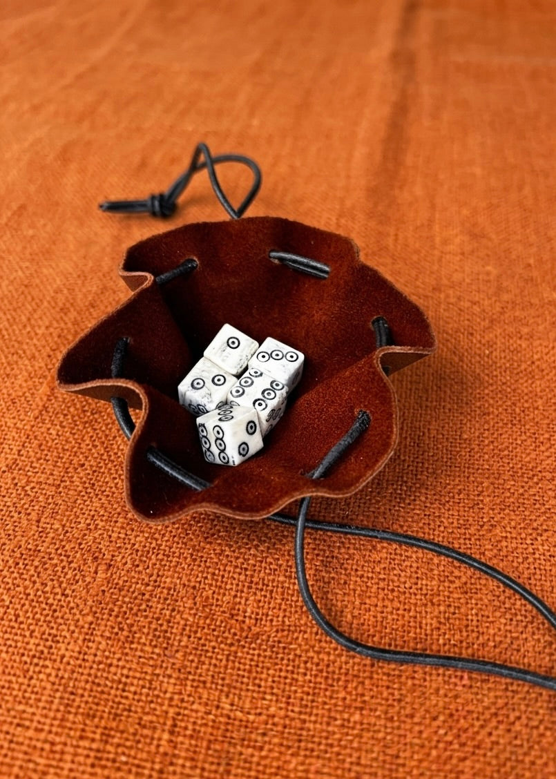 Bone cube based on numerous finds from Roman times and the Middle Ages, polished bone with ebony dust inlay, approx. 1x1cm