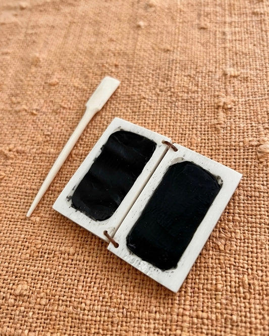 Römische Miniatur-Wachstafel mit Schreibgriffel aus Knochen