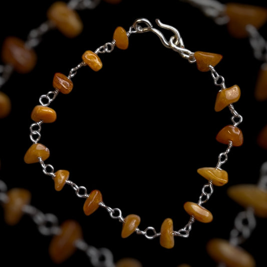 römisches Armband, 1. bis 4. Jahrhundert, Bernstein, versilberter Draht , 20cm