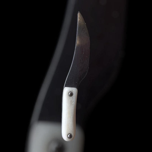 Miniature knife with bone handle and Damascus blade, 10 cm